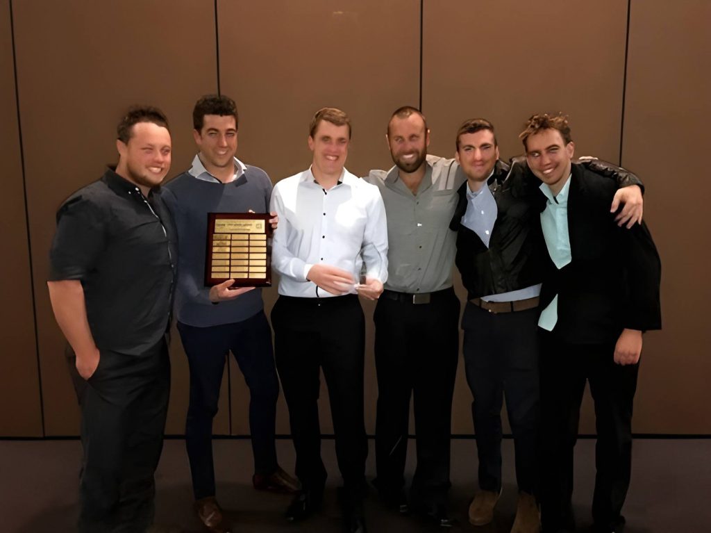 Water Tight Canberra takes a team photo during awards night