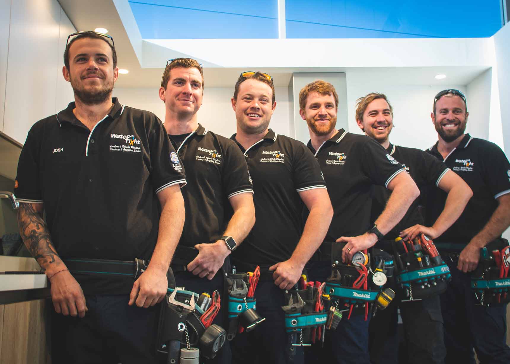 Water Tight Canberra members pose for a picture side-by-side